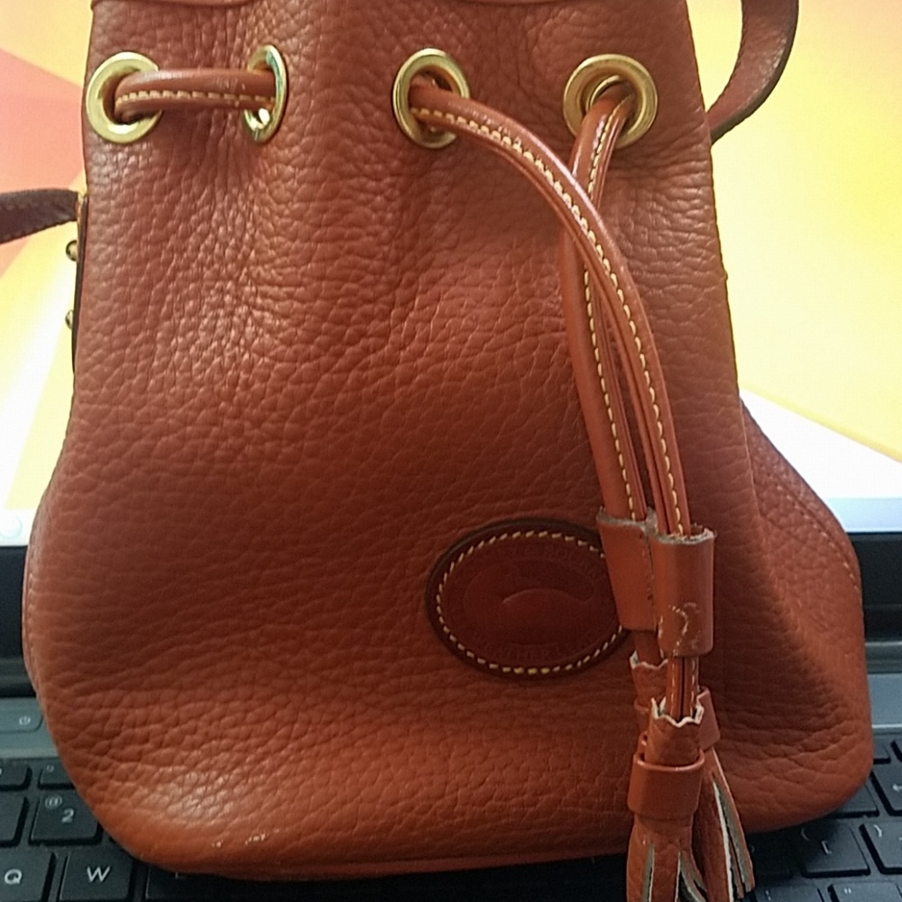 Dooney & Bourke drawstring leather purse, 8"tall,